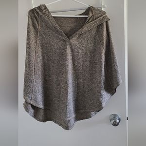 Hooded casual poncho. It doesn't have a tag with the brand name on it.